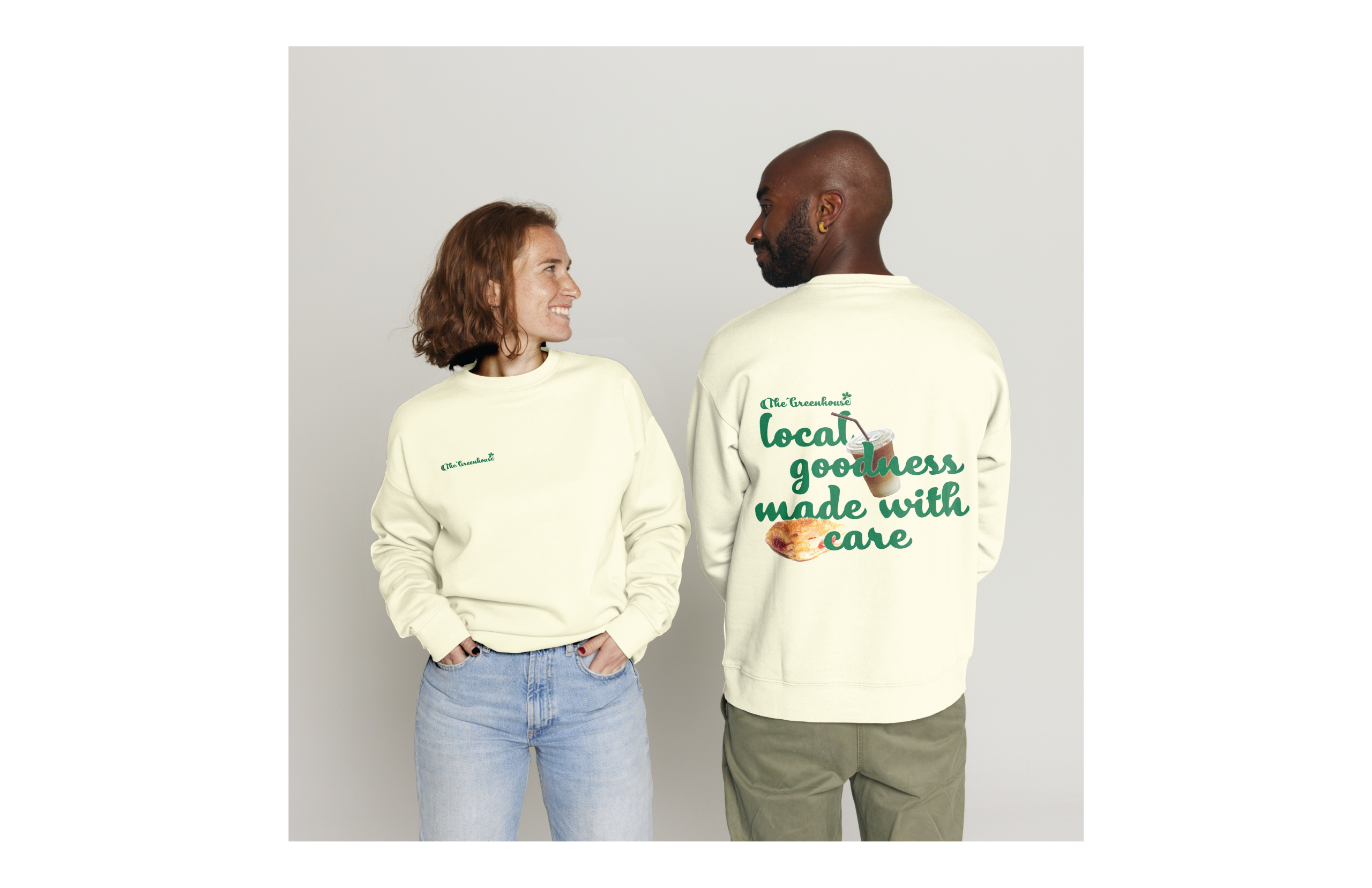 2 people wearing The Greenhouse branded sweatshirts.